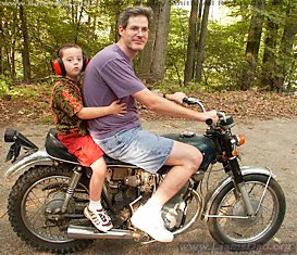 Liam and Wes riding a motorcycle